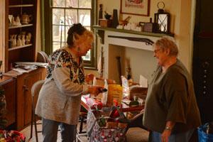 Women for Greater Philadelphia members decorating historic Laurel Hill Mansion for the 2023 Winter Holidays